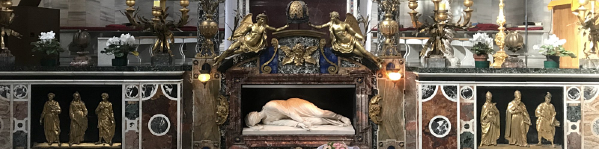The River Tiber and its island, the Basilica (and undergrounds) of Santa Cecilia in Trastevere